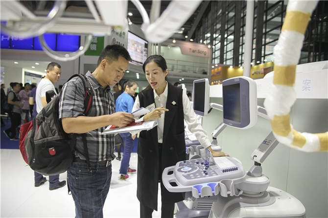Visitors learn about ultrasound application solutions
